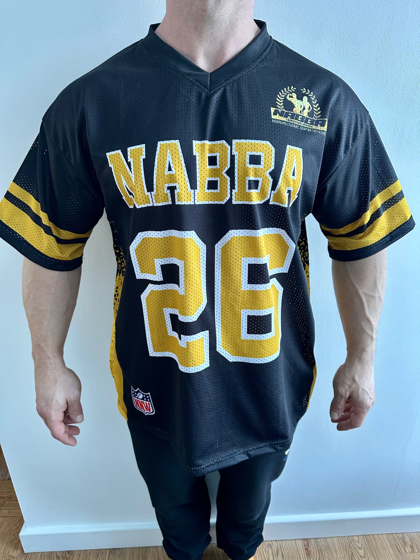 NABBA North West NFL-Style T-Shirt – 2026 Rebrand Edition